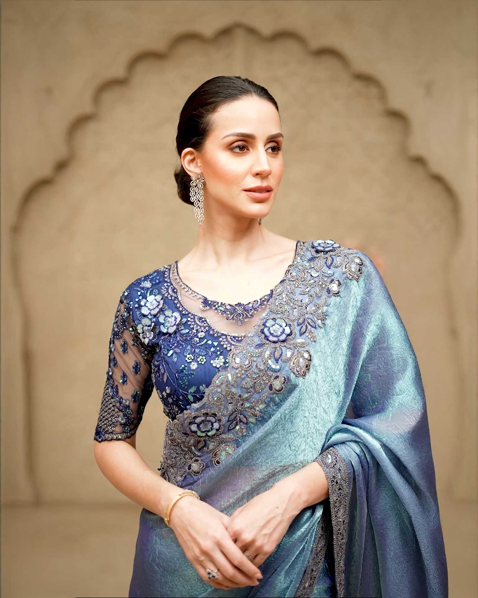 Metallic blue shimmer georgette party saree with embroidery by Rinaz