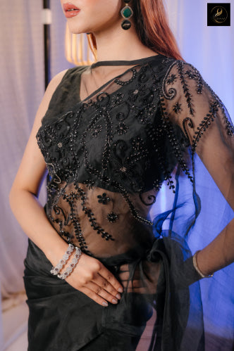 Black Muslin saree close-up – pearl and katdana embellishments