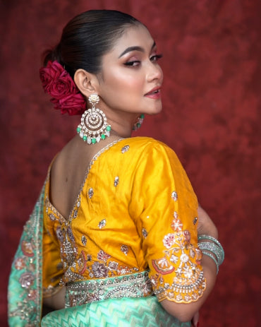 Aurelia Mint Banarasi saree close-up – pearl and stone embellishments