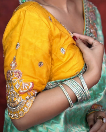 Aurelia Mint saree drape view – soft luxury sheen