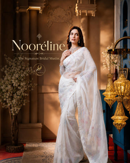 Nooréline soft ivory Sopura Muslin bridal saree with hand-painted karchupi work by Rinaz